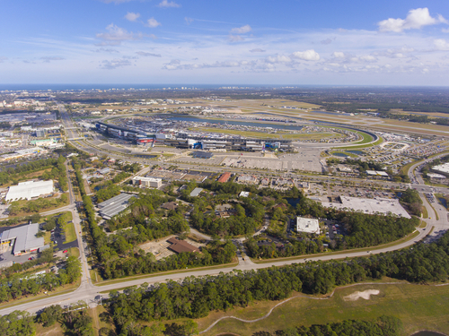 Daytona Beach International Speedway and city landscape aerial view, Daytona Beach, Florida FL, USA. It is the home for NASCAR Daytona 500.